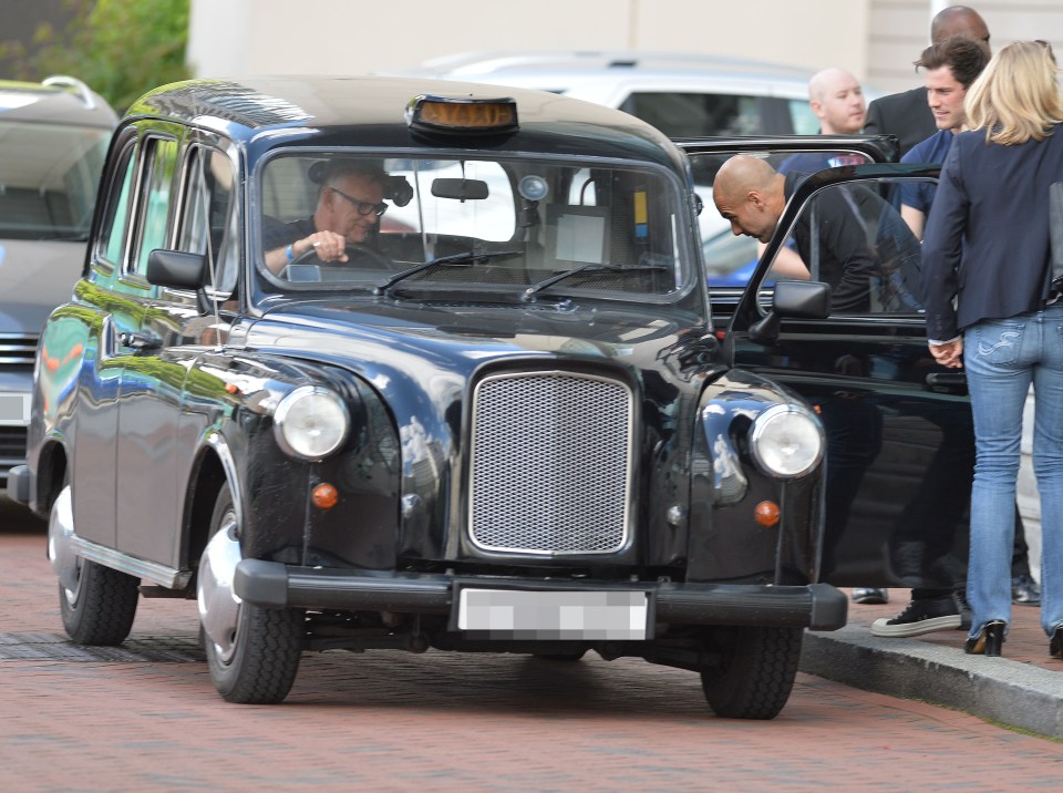  Pics Paul Cousans. Man Citys Pep Guardiola takes a black cab to the City training ground today. The new City boss jumped in to the cab and was ferried the 4 miles with his entourage behind him