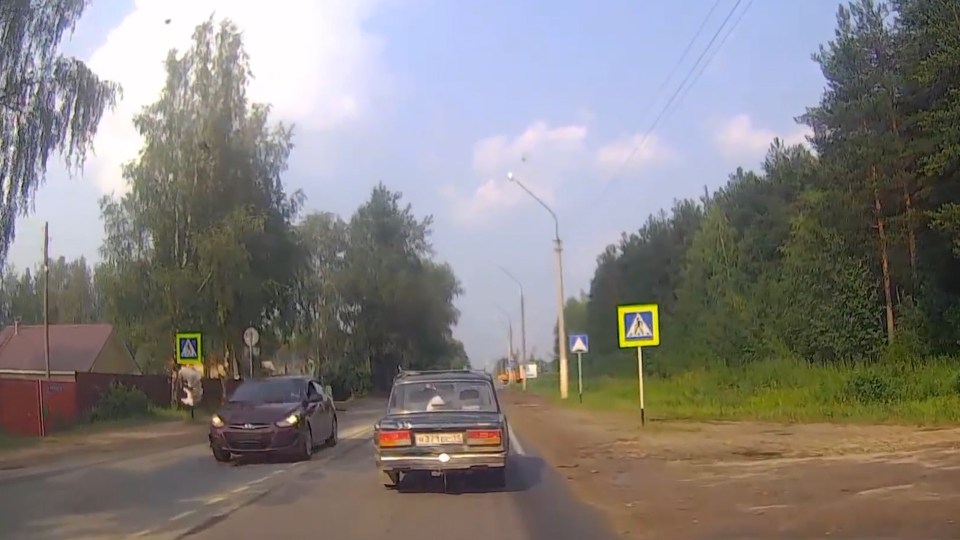  She is flung over the bonnet of the car as it keeps going and she plummets to the ground, landing on the other side of the car