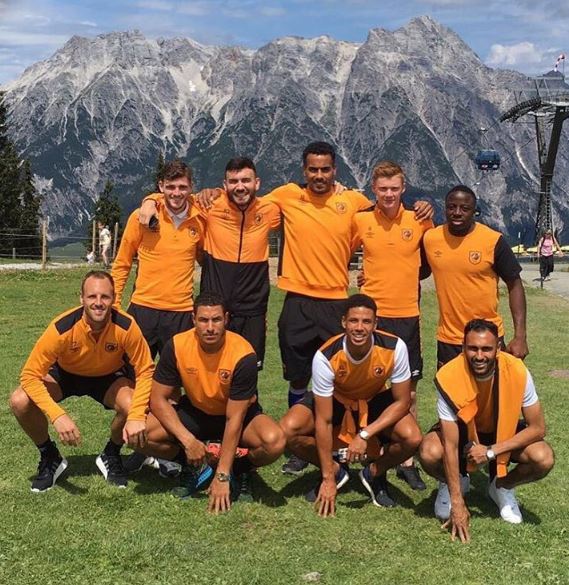  Hull City players pose for their nine-man team photo (Back row L-R) Andrew Robertson, Robert Snodgrass, Tom Huddlestone, Sam Clucas, Adama Diomande (Front row L-R) David Meyler, Jake Livermore, Curtis Davies, Ahmed Elmohamady