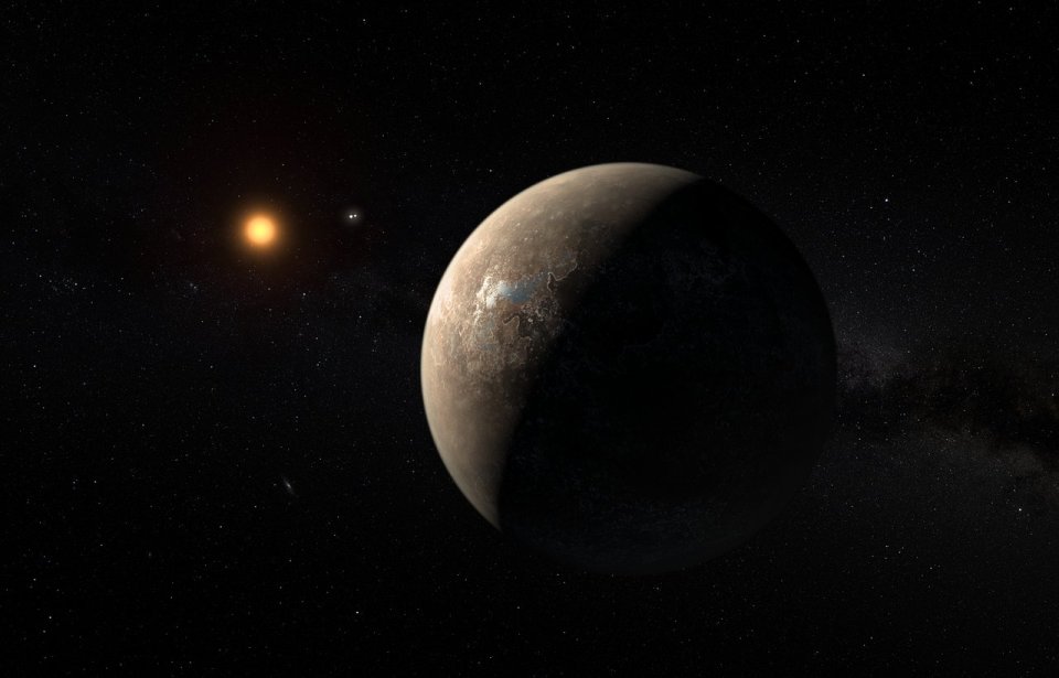  This artist’s impression shows the planet Proxima b orbiting the red dwarf star Proxima Centauri