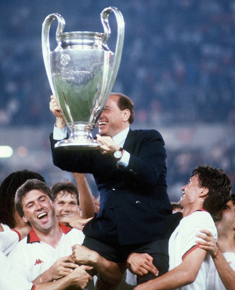  Silvio Berlusconi lifts the Champions League trophy after win over Barcelona in 1994