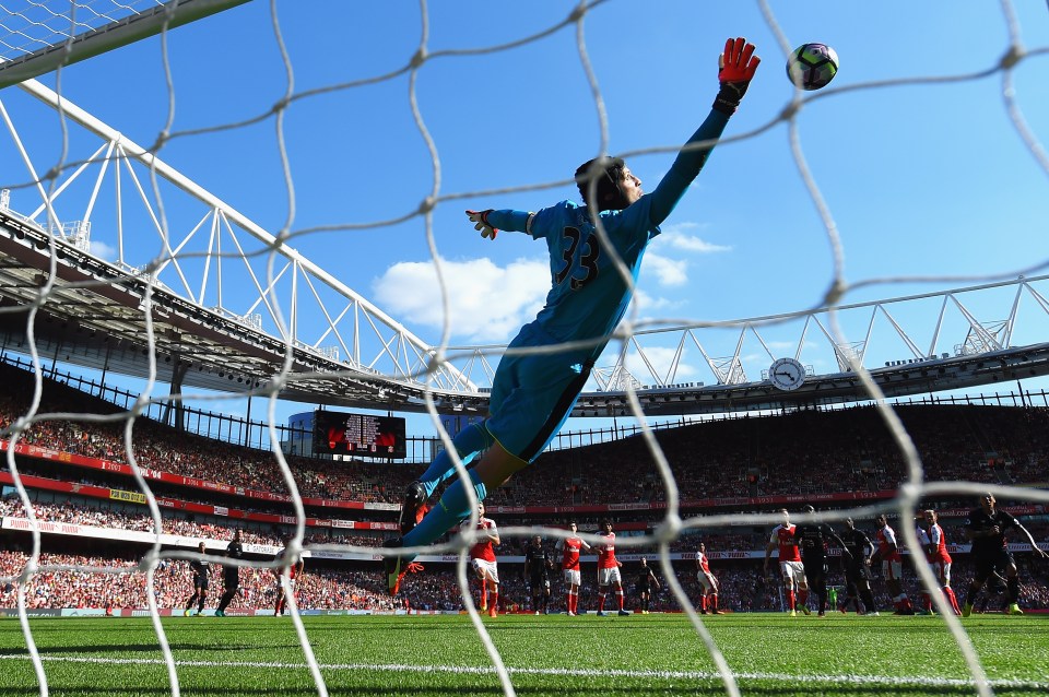  Petr Cech of Arsenal fails to stop the free kick by Philippe Coutinho