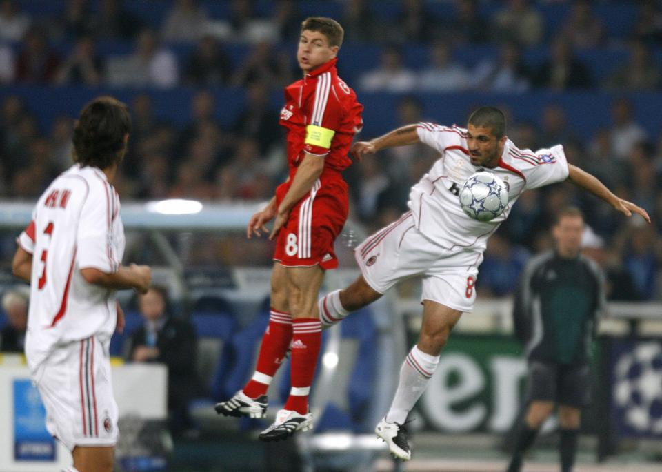 Athens, GREECE: AC Milan's midfielder Gennaro Gattuso (R) vies with Liverpool's midfielder Steven Gerrard during the Champions League final football match, at the Olympic Statdium, in Athens, 23 May 2007. AFP PHOTO OLIVIER MORIN (Photo credit should read OLIVIER MORIN/AFP/Getty Images)