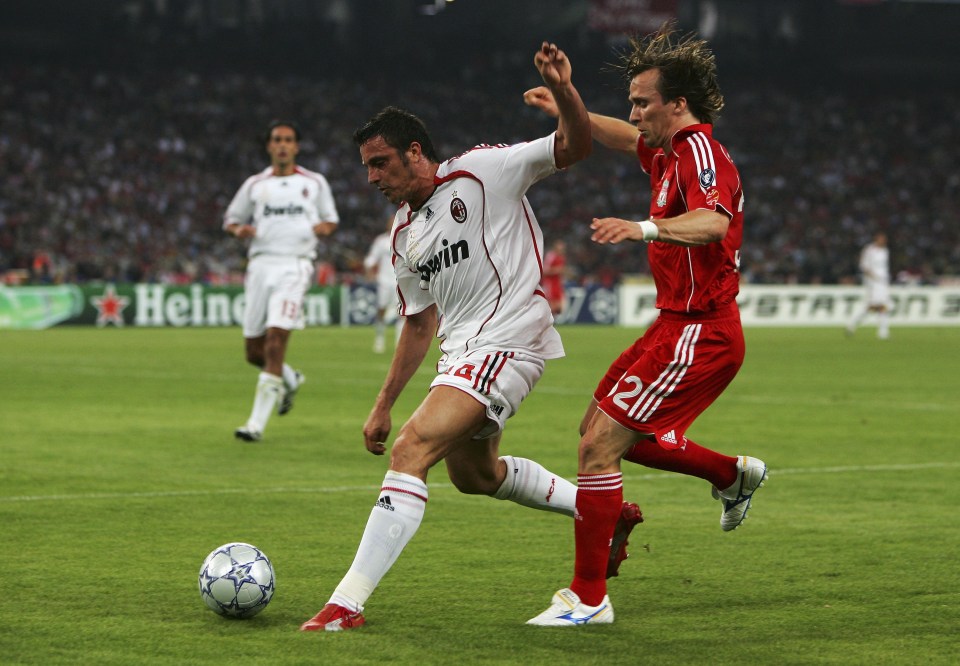 ATHENS, GREECE - MAY 23: Massimo Oddo (L) of Milan holds off the challenge from Boudewijn Zenden of Liverpool during the UEFA Champions League Final match between Liverpool and AC Milan at the Olympic Stadium on May 23, 2007 in Athens, Greece. (Photo by Alex Livesey/Getty Images)