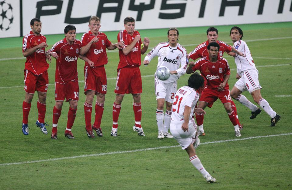 Athens, GREECE: AC Milan's midfielder Andrea Pirlo (C) kicks the ball as AC Milan's forward Filippo Inzaghi (R) prepares to score during the Champions League final football match against Liverpool, at the Olympic Statdium, in Athens, 23 May 2007. . AFP PHOTO / ARIS MESSINIS (Photo credit should read ARIS MESSINIS/AFP/Getty Images)