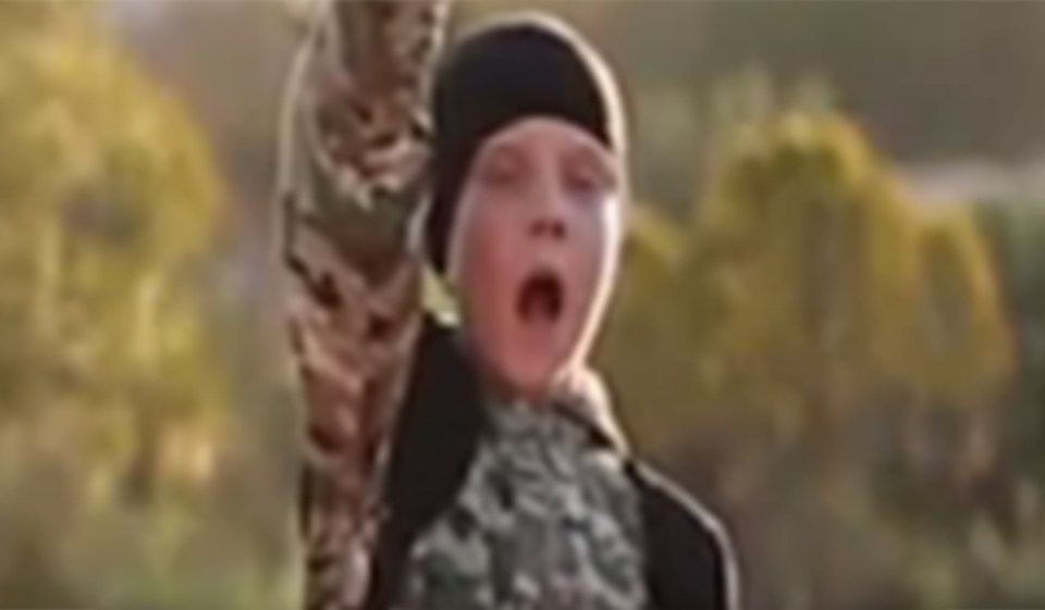  A British child is believed to be one of five children executing prisoners in an ISIS video