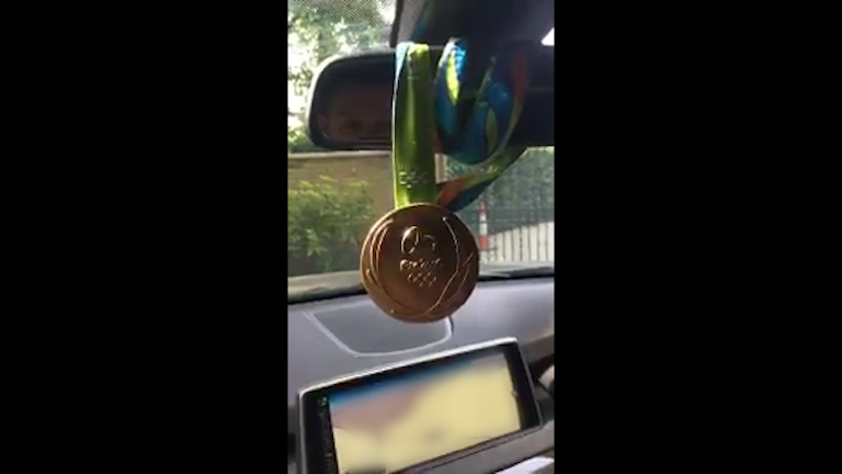  Blunder...The Olympian accidentally shows sat nav with precise address while filming his gold medal