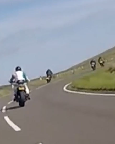  The two bikes can be seen driving at each other head on (right of shot)