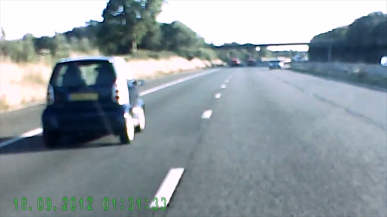  Dash cam footage shows vehicle heading down the wrong side of motorway