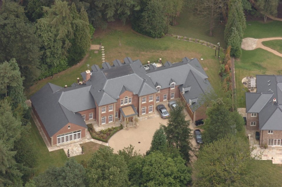  Cops swooped on Rooney's £6m mansion after the sophisticated security system was triggered