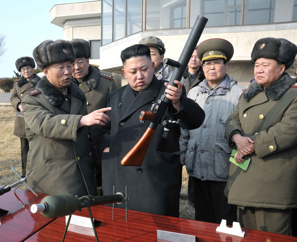  Kim Jong-Un inspecting an artillery firing drill of the Korean People's Army