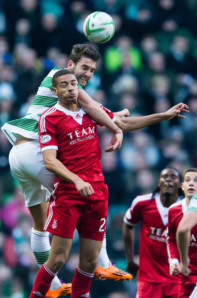  On loan at Aberdeen...Hector challenges Celtic's Charlie Mulgrew