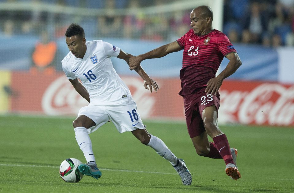  Joao Mario in action against Jesse Lingard during 2015 European Under 21's Champs