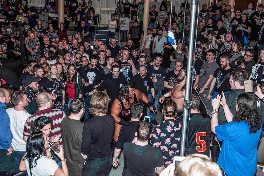  Rhyno battles in the street during a bout for Insane Championship Wrestling