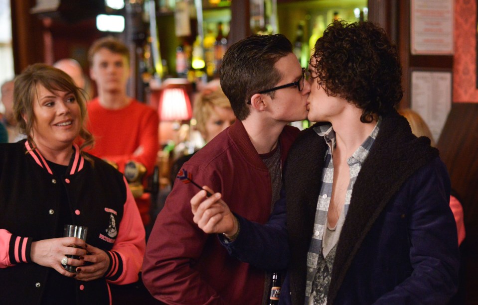  Ben Mitchell and his late lover Paul Coker share a kiss in the Queen Vic before the kidnapping occurred