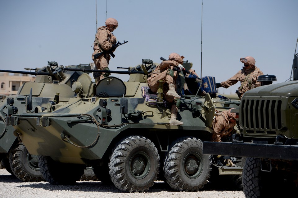  Russian soldiers with their vehicles at their military camp in the ancient Syrian city of Palmyra