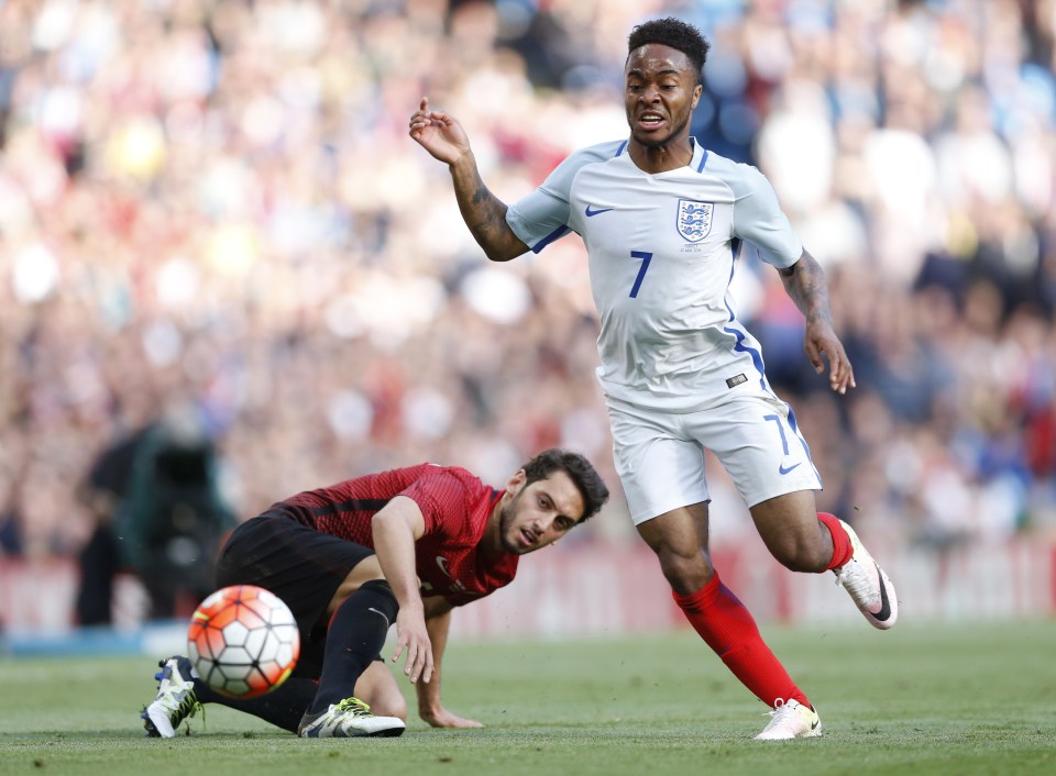  Calhanoglu up against England's Raheem Sterling in a pre-Euro 2016 friendly