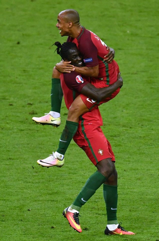  Joao Mario and Eder celebrate as Portugal beat France to win Euro 2016