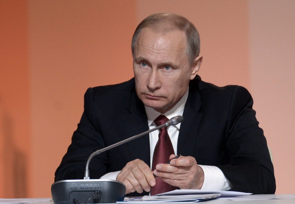  Menacing... Vladimir Putin has been accused of launching a secret propaganda war on the UK