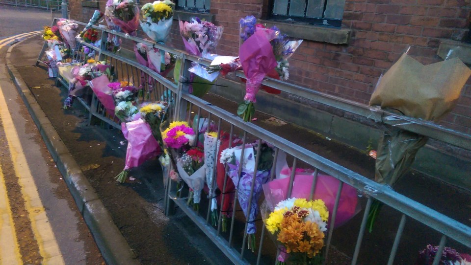  Mourners left flowers at the scene of the tragic accident