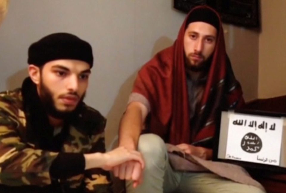  Faces of evil... Abdelmalik Petitjean (right) and Adel Kermiche appear in a chilling ISIS video before killing a Catholic priest in a French church last week