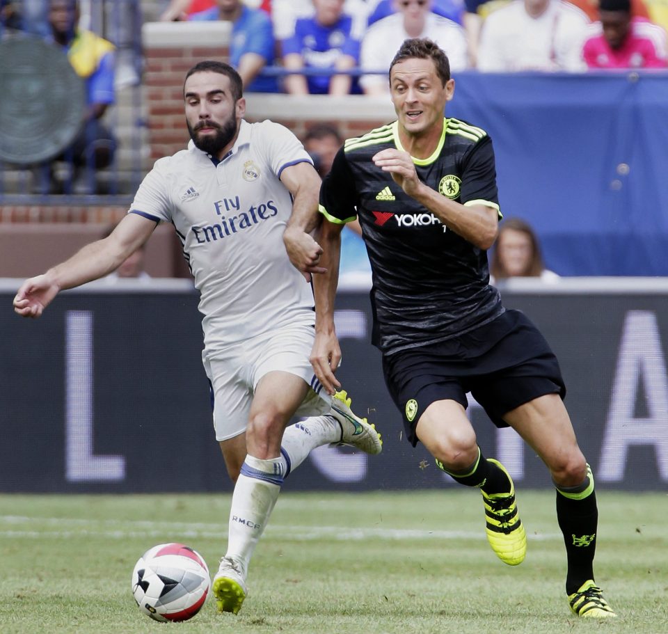 ANN ARBOR, MI - JULY 30: Jose Fernandez 0436 of Real Madridtries to pull Nemanja Matic 04321 of Chelsea off the ball during the first half at Michigan Stadium on July 30, 2016 in Ann Arbor, Michigan. (Photo by Duane Burleson/Getty Images)