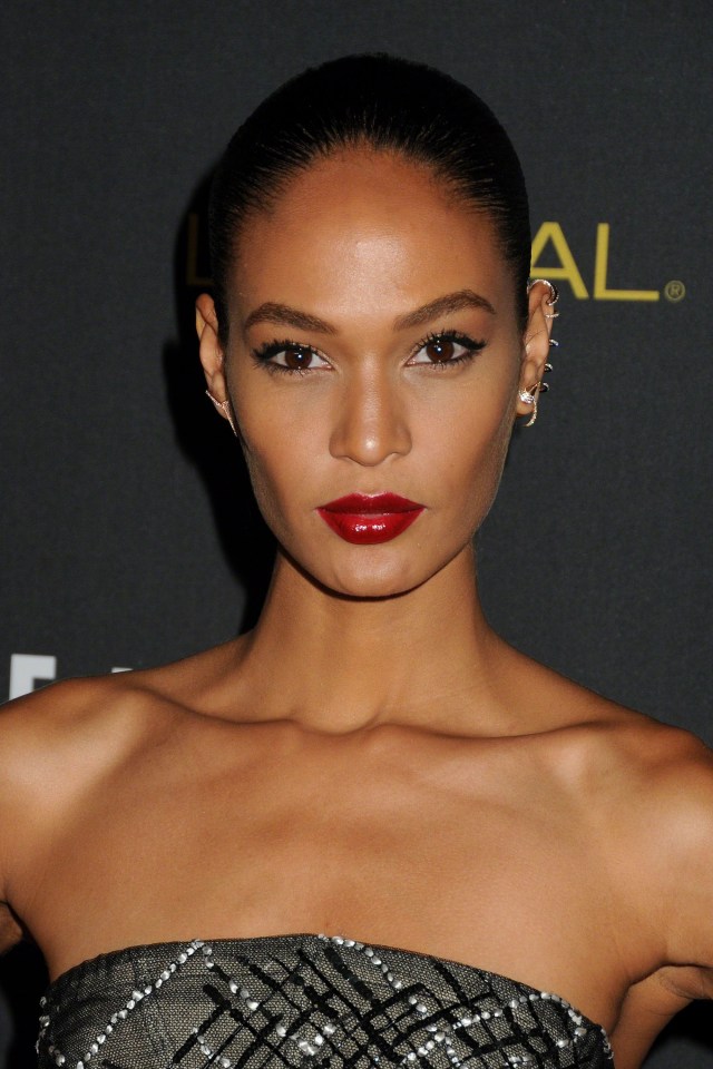  Mysterious girl . . . model Joan Smalls uses red lippy to feel great