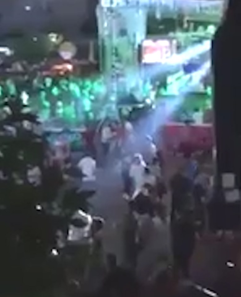  Panic ... Hundreds were seen fleeing in horror from the busy festival after someone shouted 'ISIS'