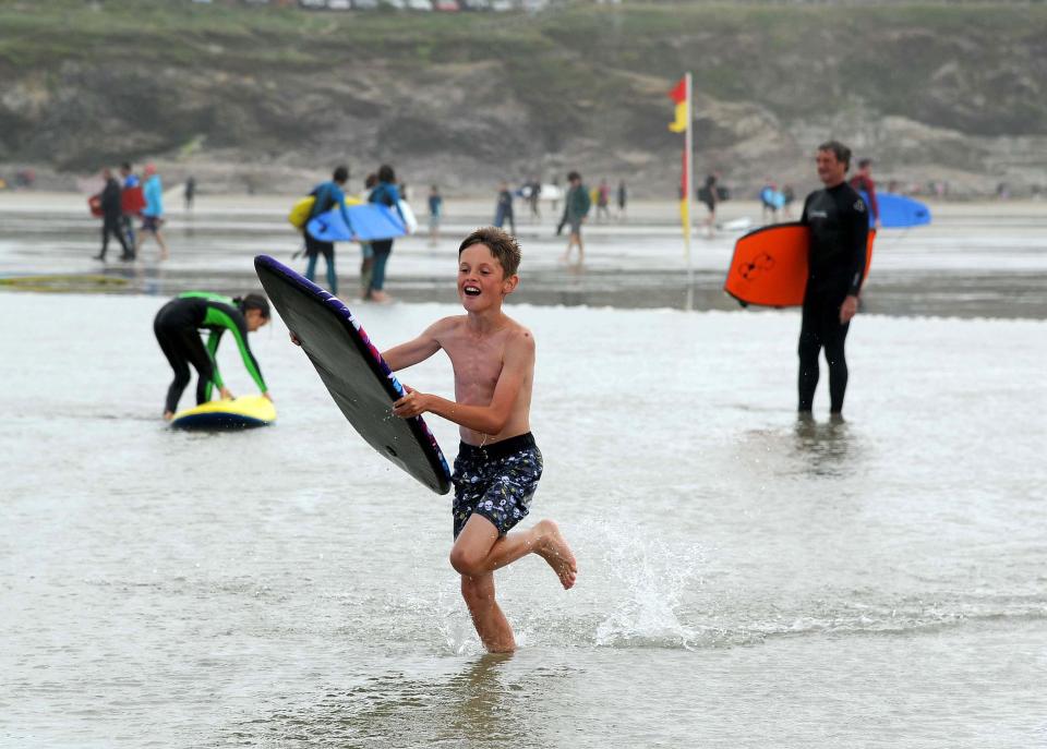 On Thursday surfers and body boarders enjoyed a day on the beach in Polzeath, Cornwall