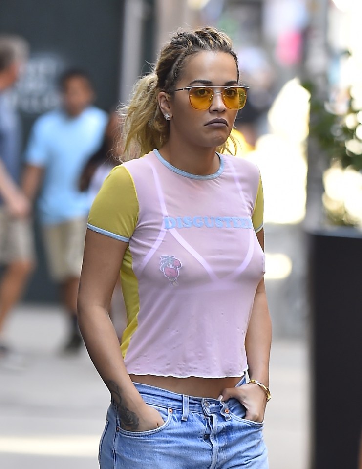  Her white bralet was clearly visible through the mesh top