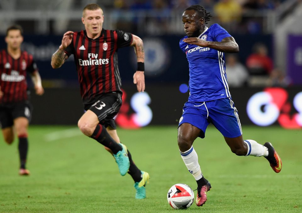  Victor Moses has a run at the AC Milan defence during the pre-season clas