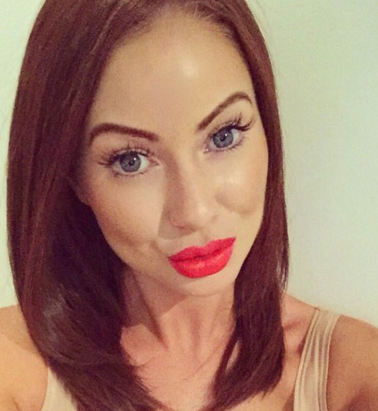  The reality TV star revealed her plumped up pout sporting bright orange lipstick