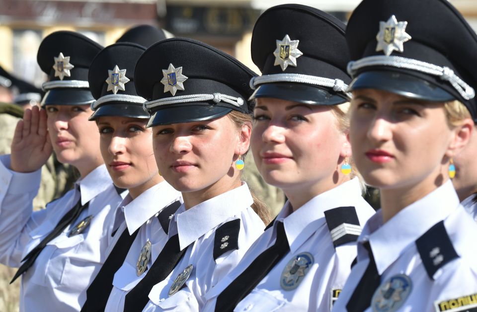  Police officers attend an official ceremony in the center of Kiev