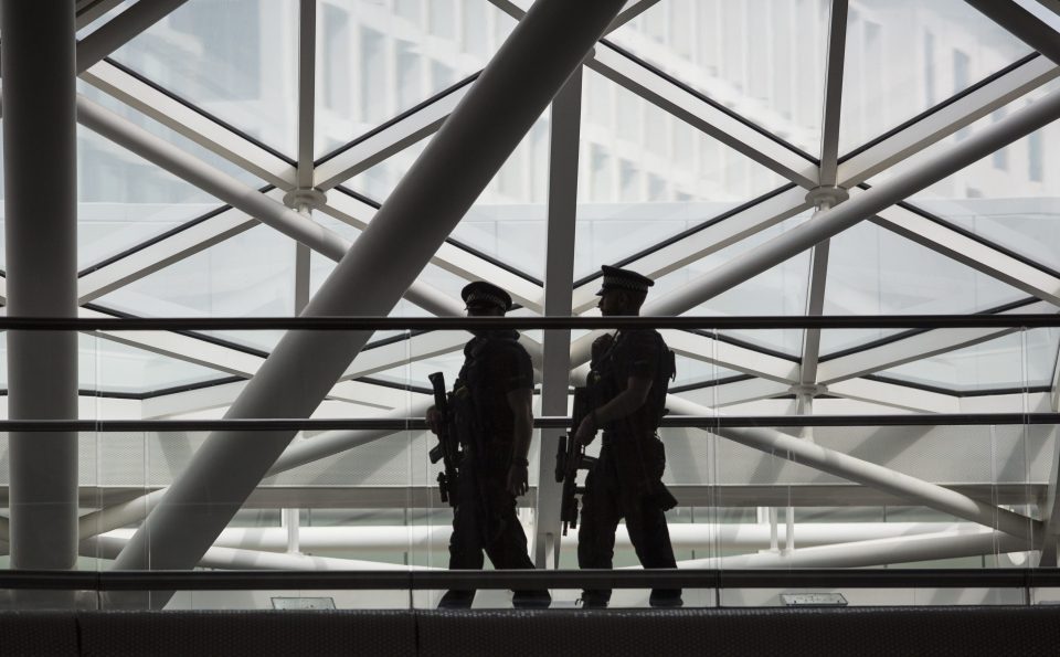  Two cops kept a watchful eye from height at London’s St Pancras station