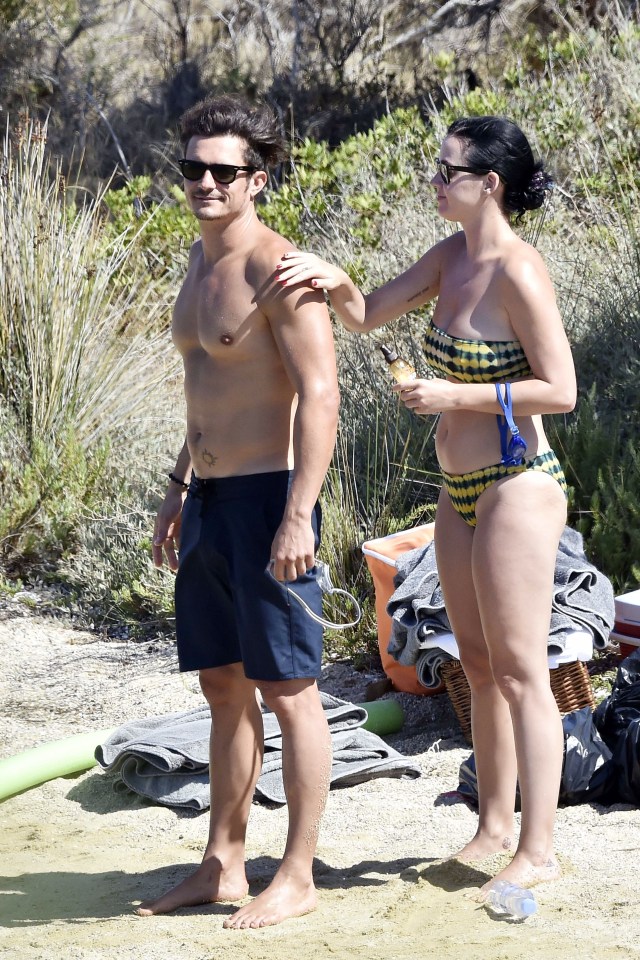  Katy helped her boyfriend stay protected for the sun