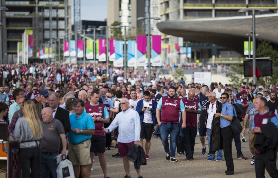  West Ham supporters arrive for their team's first match at their new stadium