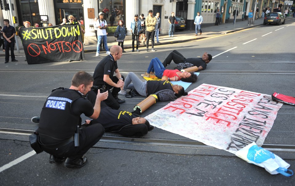  Activists with signs and banners could be seen blocking the road outside the Nottingham Theatre Royal