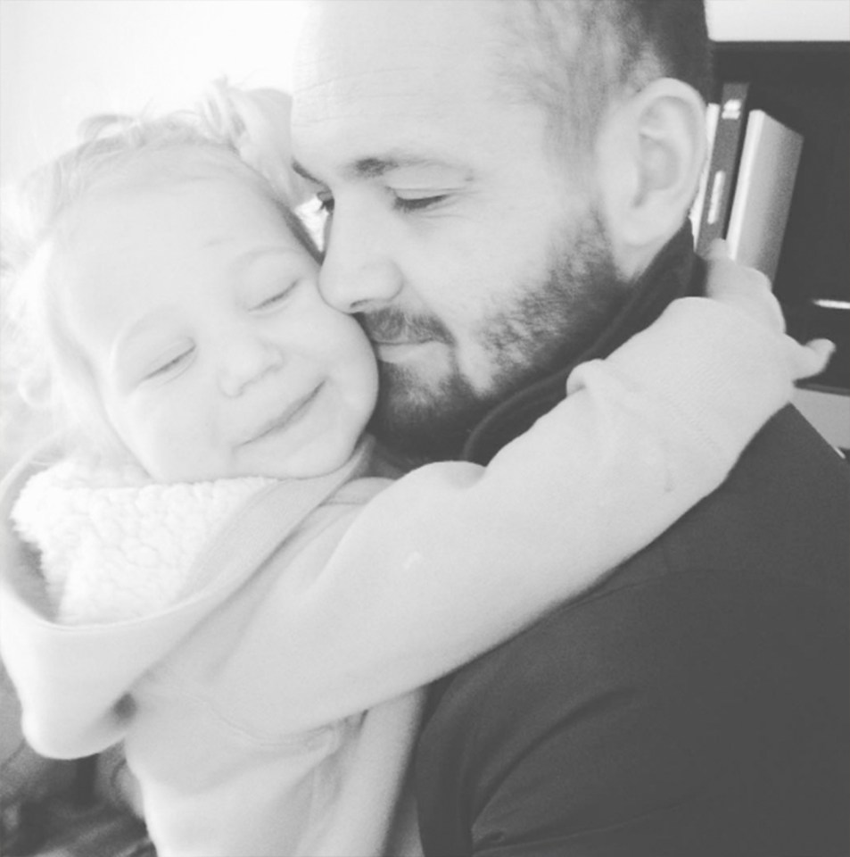 Ross hugs their daughter in this tender Instagram post