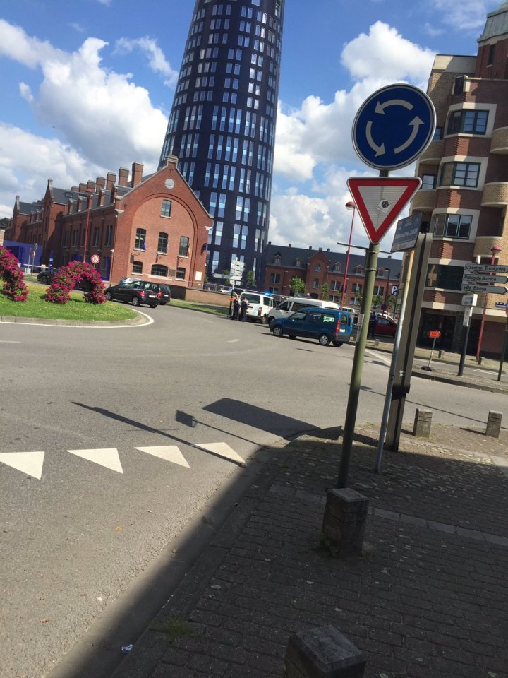  Stabbing ... Police officers cordon off area near a station in the Belgian town of Charleroi