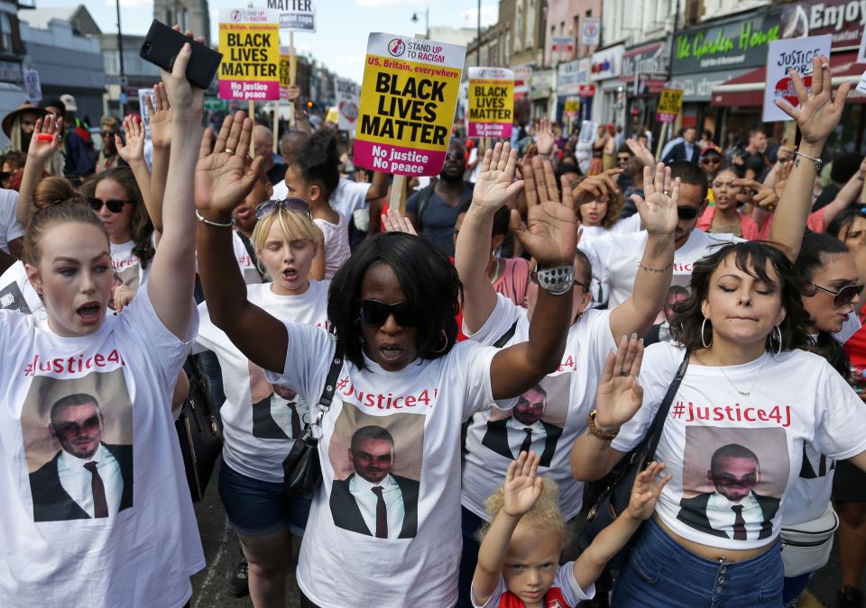  The group wore t-shirts with a picture of Jermaine Baker, who was shot dead outside Wood Green Crown Court by an armed police officer in December