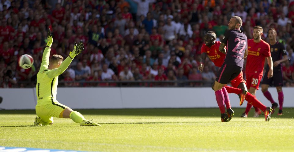  Liverpool forward Sadio Mane picks out the top corner with a striker's instinct