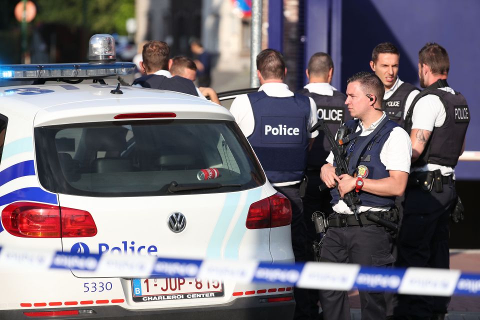  Two police officers were attacked with a machete in the Belgian city of Charleroi yesterday