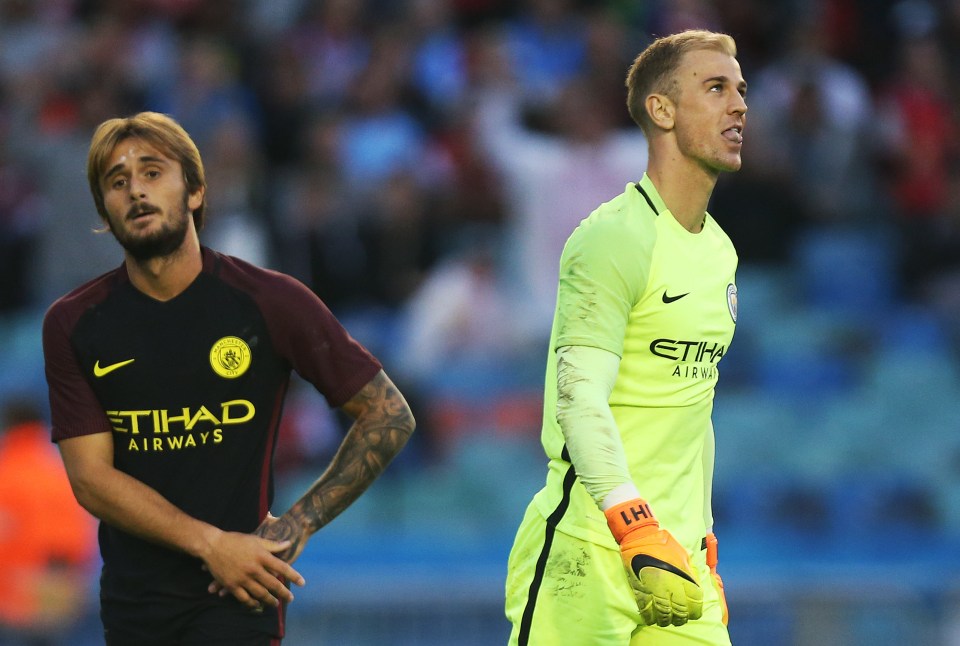  Joe Hart will be unhappy to concede three in the defeat to Arsenal