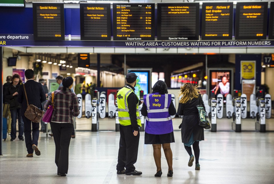  Passengers look at departure boards at Victoria station today as a week-long RMT strike crippled the Southern Rail network