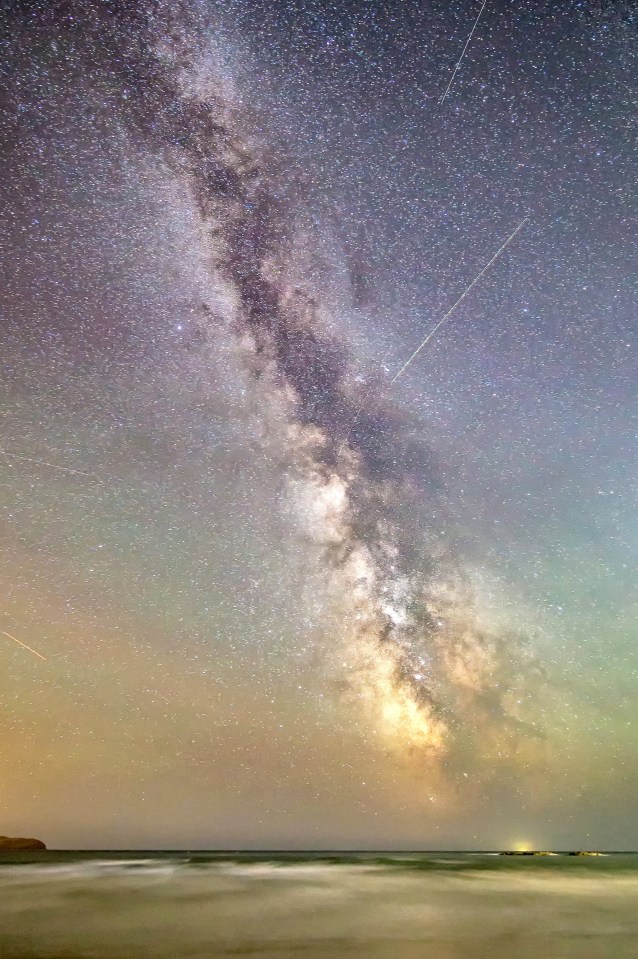  A shooting star streaks across the Milky Way in one of natures most spectacular annual events