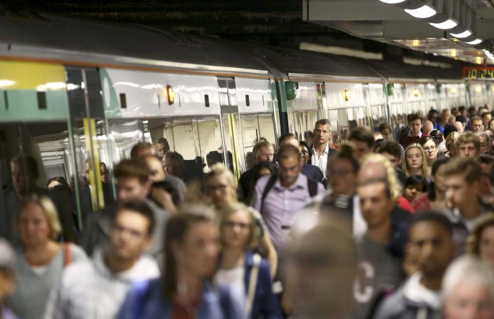 Passengers disembark from a South train at Victoria Station 