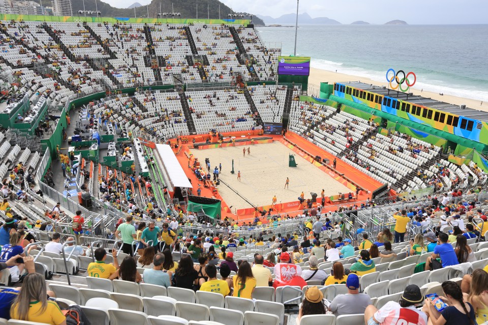  A sprinkling of fans watch Australia v Switzerland in the Volleyball Arena