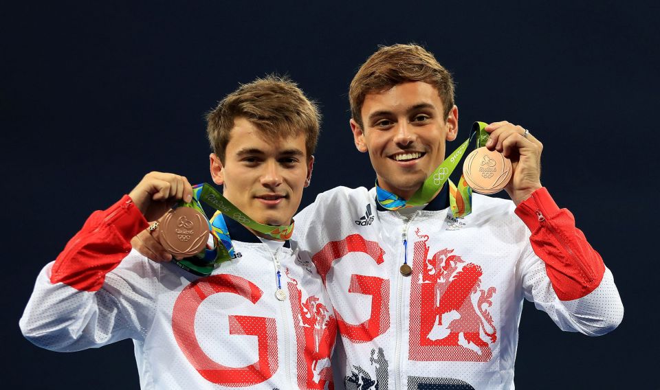 Daley and Goodfellow on the podium with their bronze medals