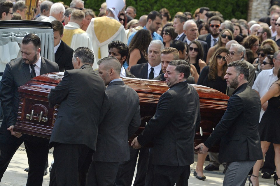  Mourners carry the casket of Karina Vetrano from St. Helen's Church following her funeral in Howard Beach