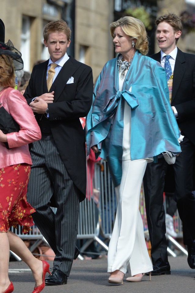  The new Duke of Westminster is one of the world's most eligible bachelors. He is seen here with his mother Natalia at the society wedding of Lady Melissa Percy and Thomas van Straubenzee in 2013